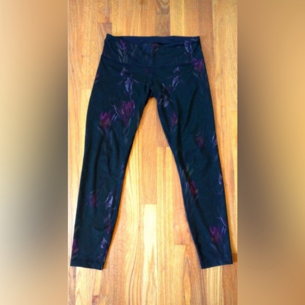 Lululemon Size 6 7/8 length Color: Black, purple, pink,green Fabric: Luon